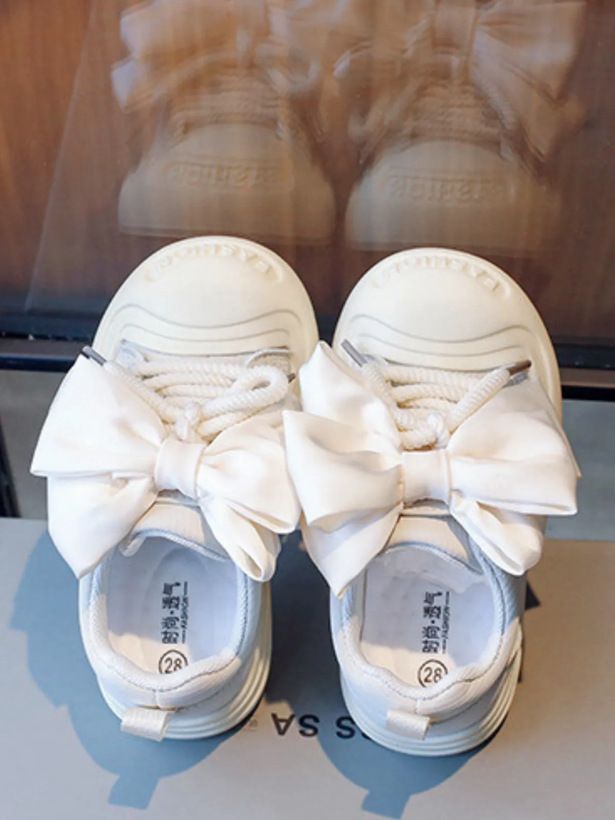 Tiny Toes, Big Dreams Satin Bow Sneakers By Liv and Mia