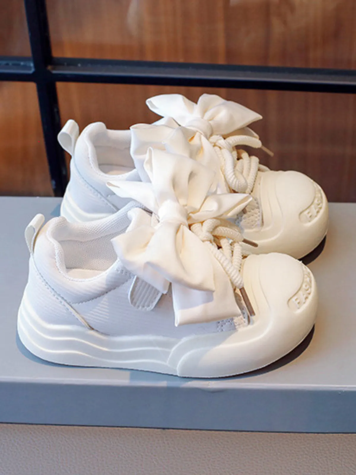 Tiny Toes, Big Dreams Satin Bow Sneakers By Liv and Mia